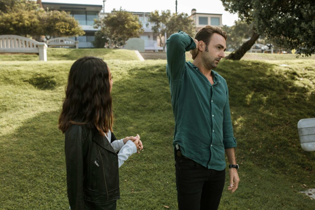 Two people trying to understand each other during a conversation, showing a language barrier situation while communicating in Prague