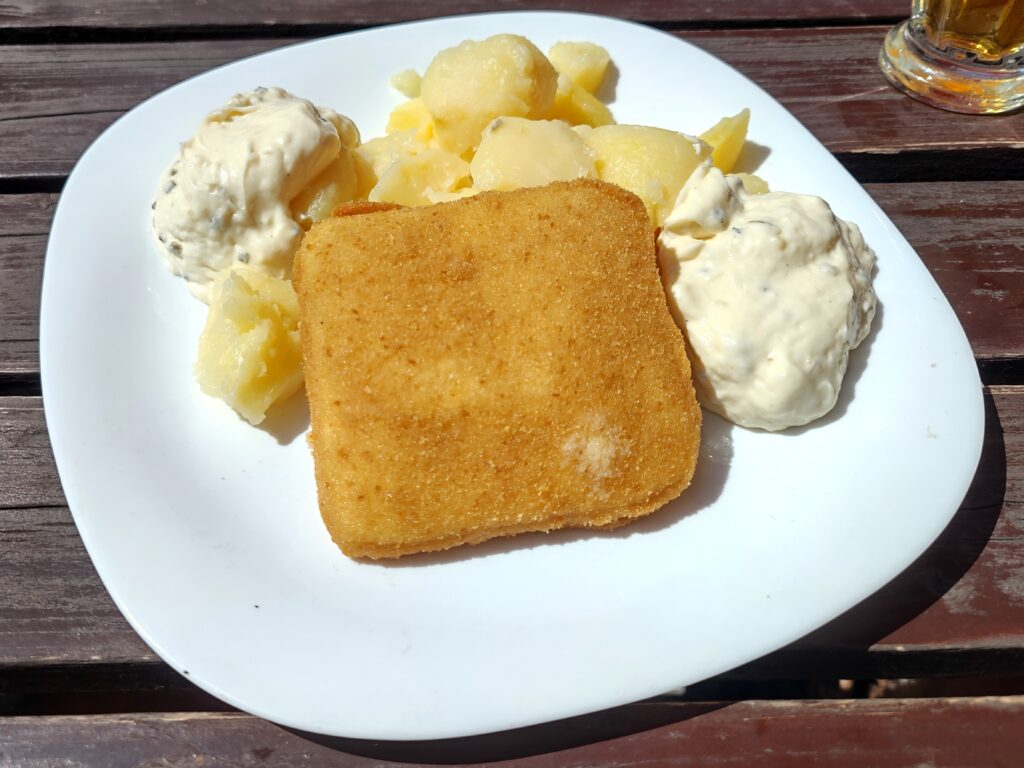 Smažený sýr (fried cheese) with boiled potatoes and tartar sauce – popular Czech dish in Prague Food Guide