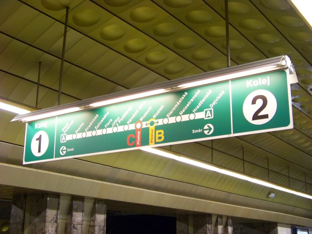 Prague Metro Line A platform sign showing stations and direction board at Můstek station