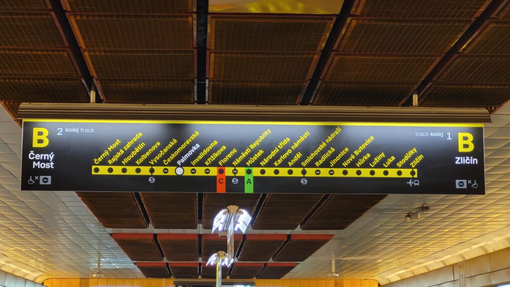Prague Metro Line B platform sign at Palmovka station showing all stations and directions toward Zličín and Černý Most