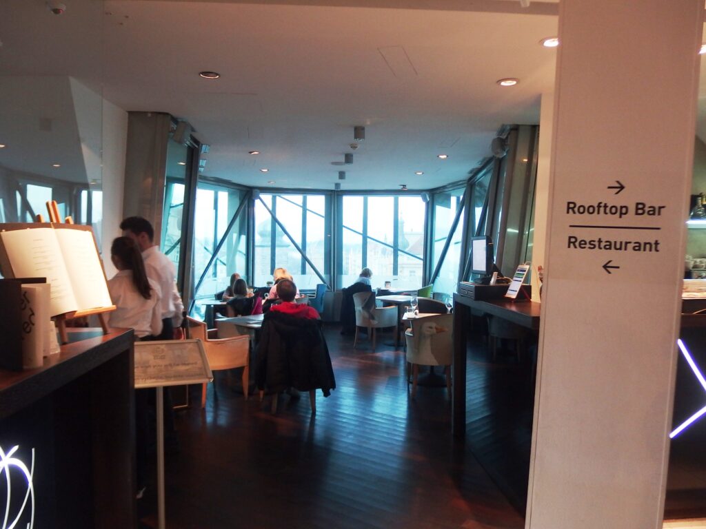 Interior of Ginger and Fred Restaurant with panoramic city views