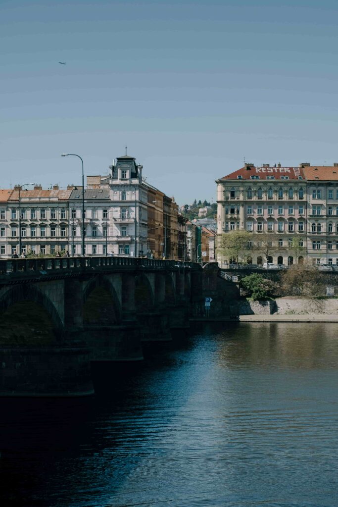 Prague Bridges panoramic view across the Vltava River with historic architecture and riverside scenery in Prague