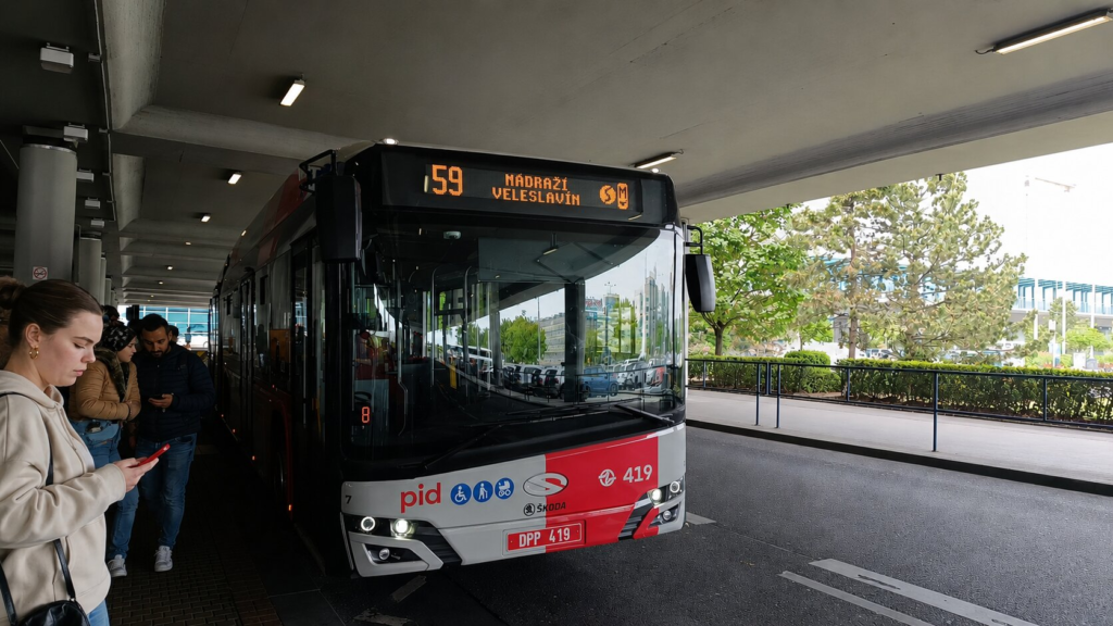 Prague Buses 2026 airport Bus 59 waiting at the terminal near Nádraží Veleslavín Metro Station in Prague.