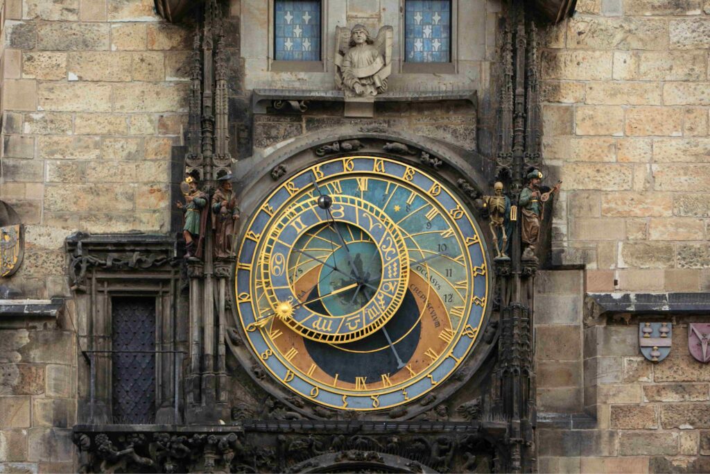 Prague Astronomical Clock on Old Town Square Prague with visitors gathering to watch the hourly Apostles procession
