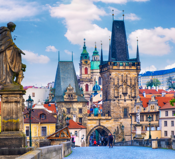Prague Bridges featuring Charles Bridge with Gothic towers and historic architecture in Prague Czech Republic