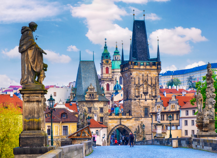 Prague Bridges featuring Charles Bridge with Gothic towers and historic architecture in Prague Czech Republic