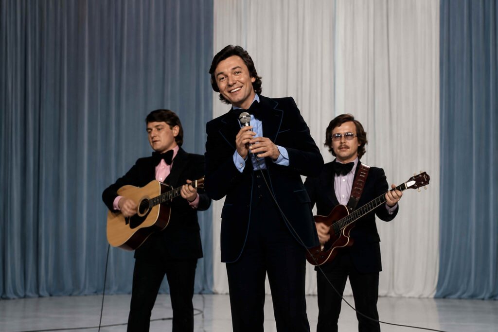 Famous People in Prague: Czech singer Karel Gott performing on stage with his band