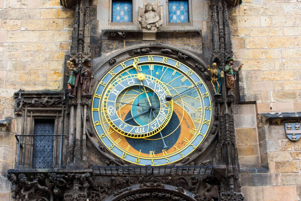 The Prague Astronomical Clock (Orloj) on the Old Town Hall, the famous medieval clock associated with the legend of Master Hanuš and one of the most enduring dark stories in Prague