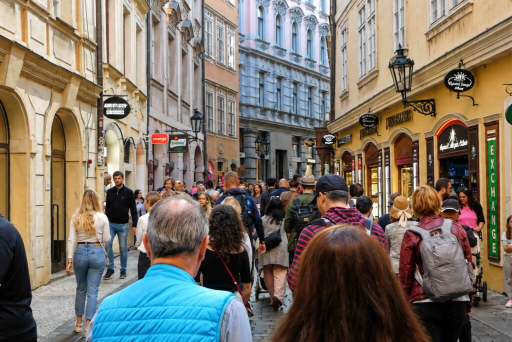 Crowds walking along Karlova Street, one of the most famous Prague Streets in the Old Town