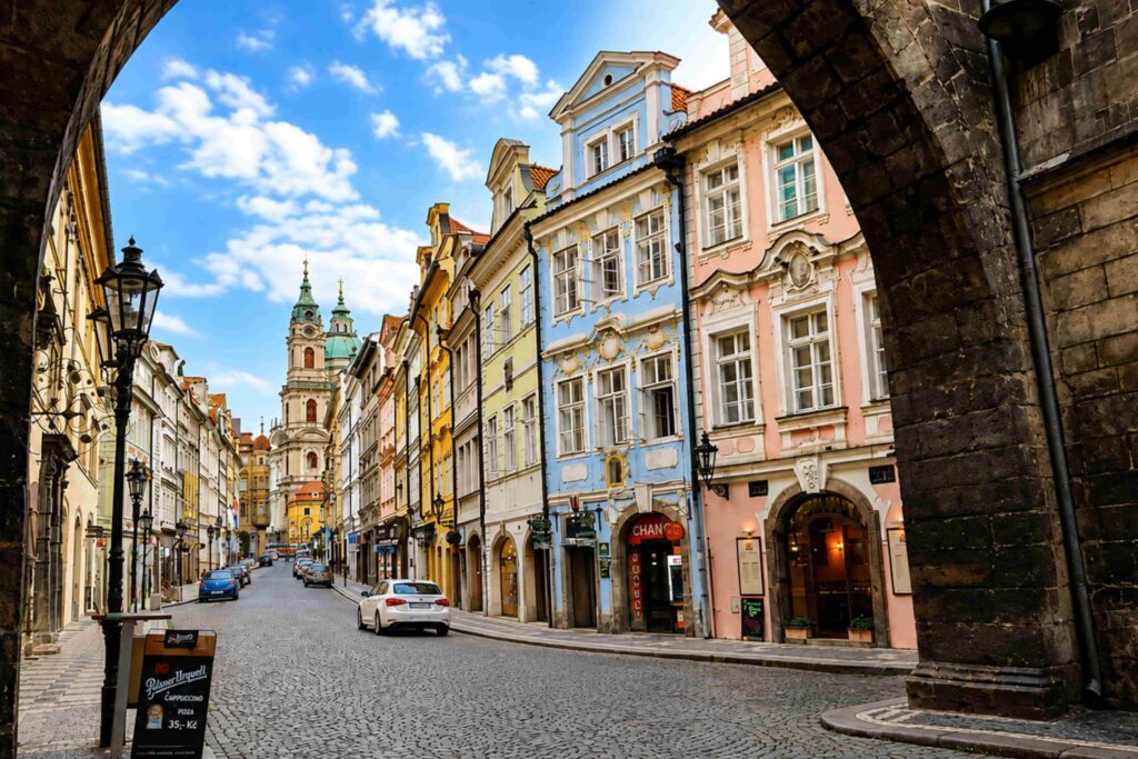 Historic buildings and cobblestone road on Mostecká Street, one of the most iconic Prague Streets in Prague