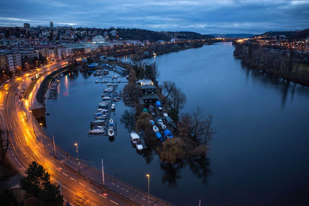 Ships and boats along Vltava River, one of the beautiful rivers in the world