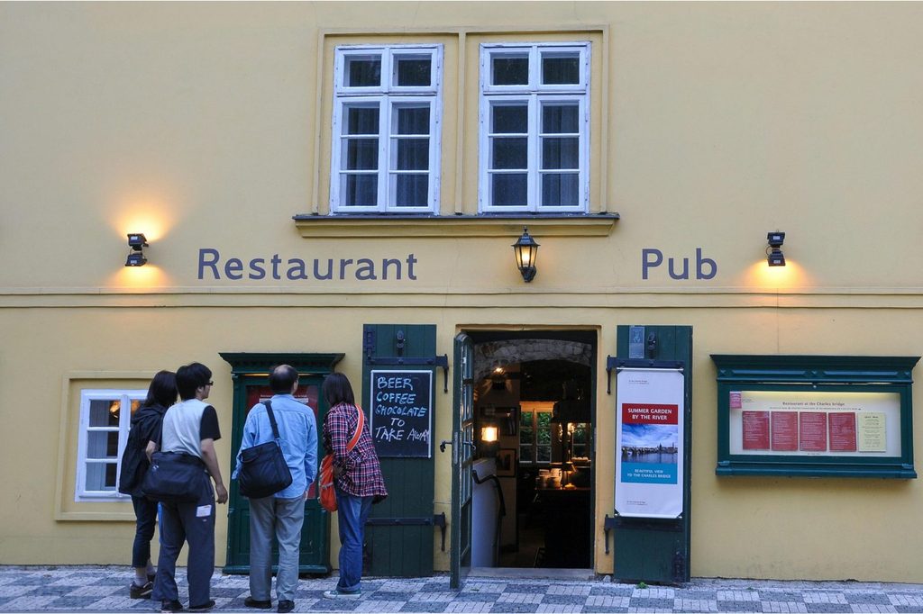 Prague themed walks featuring food and beer at a traditional restaurant and pub