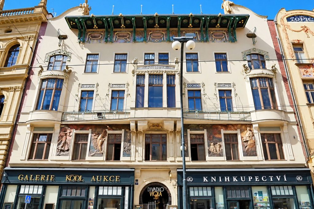 Prague Insurance Company building on Národní třída showcasing Art Nouveau Prague architecture with sculptural decoration and lettering