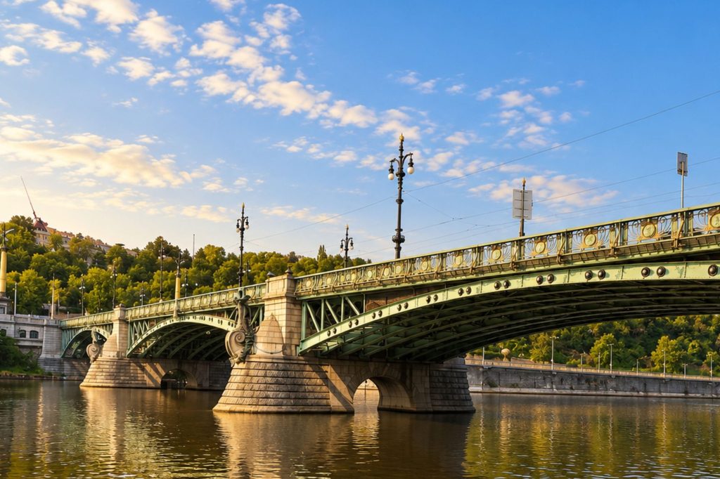 Svatopluk Čech Bridge in Prague showcasing Art Nouveau Prague architecture with ornate lamps, bronze sculptures and a decorative steel structure